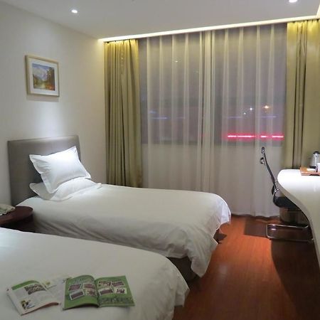 Yiting Si Ji Hotel Nantong Gongnong North Road Buitenkant foto